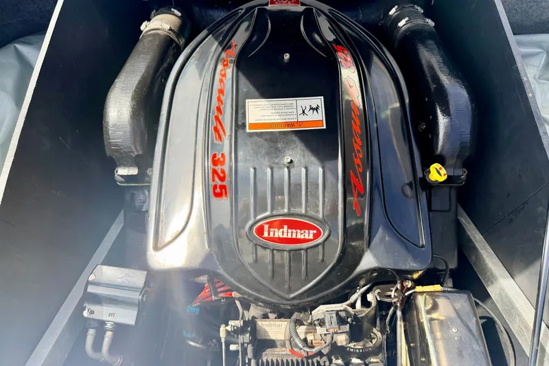 Slide: The Image of 2007 Moomba Outback V engine, Indmar 325, black with red lettering. - 28