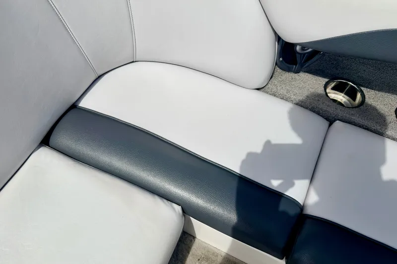 Slide: The Image of 2007 Moomba Outback V boat interior with white and dark upholstery. - 38