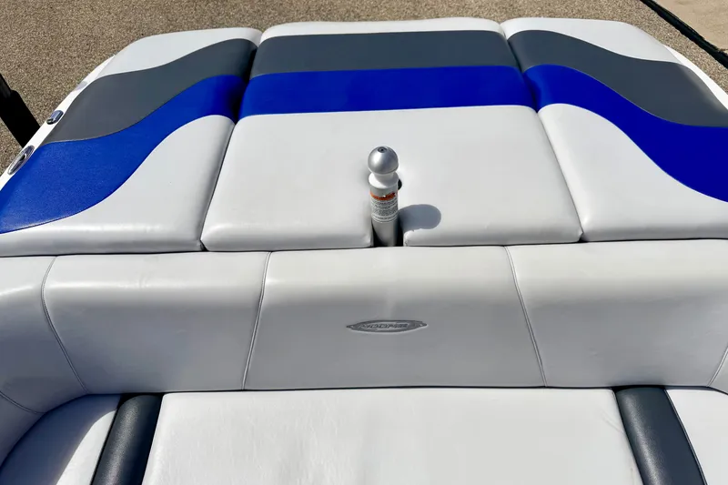Slide: The Image of 2007 Moomba Outback V boat interior with blue and gray upholstery. - 22