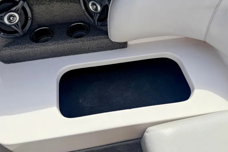 Slide: The Image of 2007 Moomba Outback V boat interior with speakers and storage compartment. - 32
