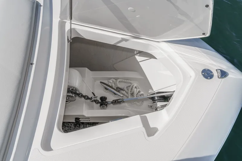 Slide: The Image of An anchor locker on a Tiara Yachts 48 LS boat with anchor and rope. - 16