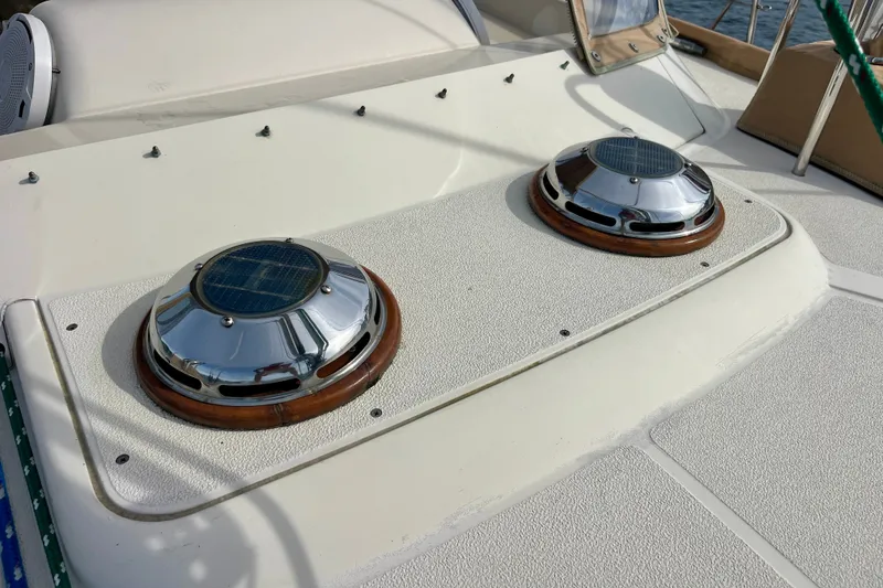 Slide: The Image of Solar-powered vents on a 2000 Moody 42 yacht deck. - 32