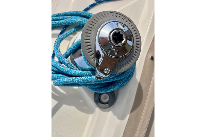 Slide: The Image of Winch with blue rope on 2000 Moody 42 sailboat deck. - 33