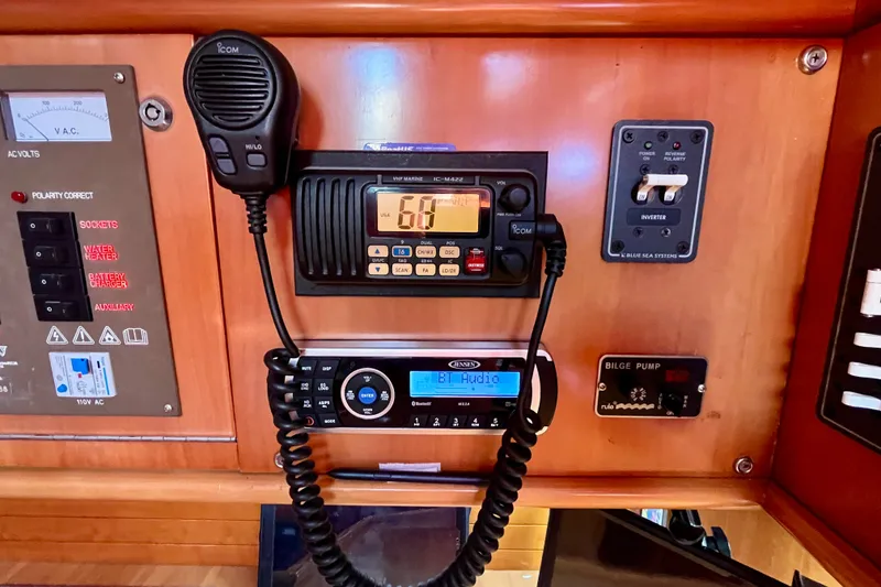 Slide: The Image of Control panel of a 2000 Moody 42 yacht with radio and bilge pump. - 34