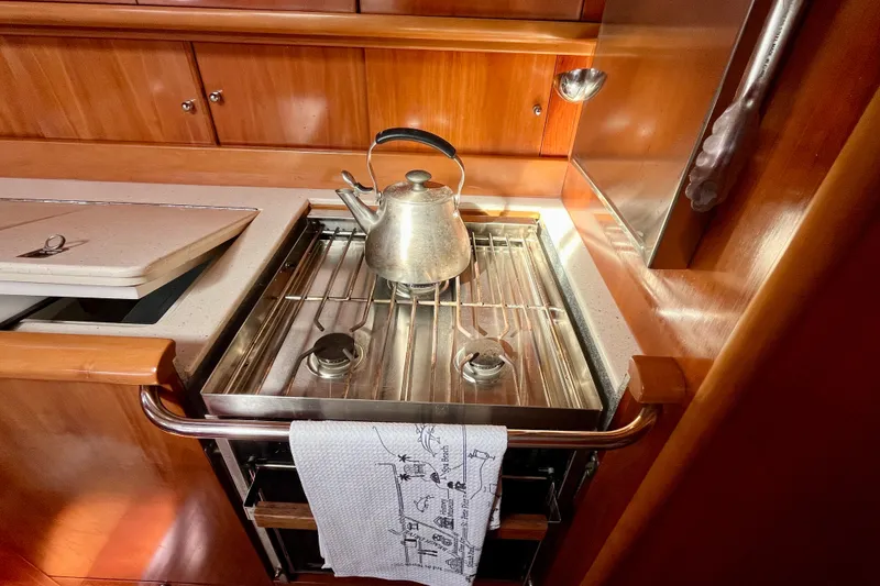 Slide: The Image of Stainless steel kettle on stove in Moody 42 yacht kitchen, 2000 model. - 25
