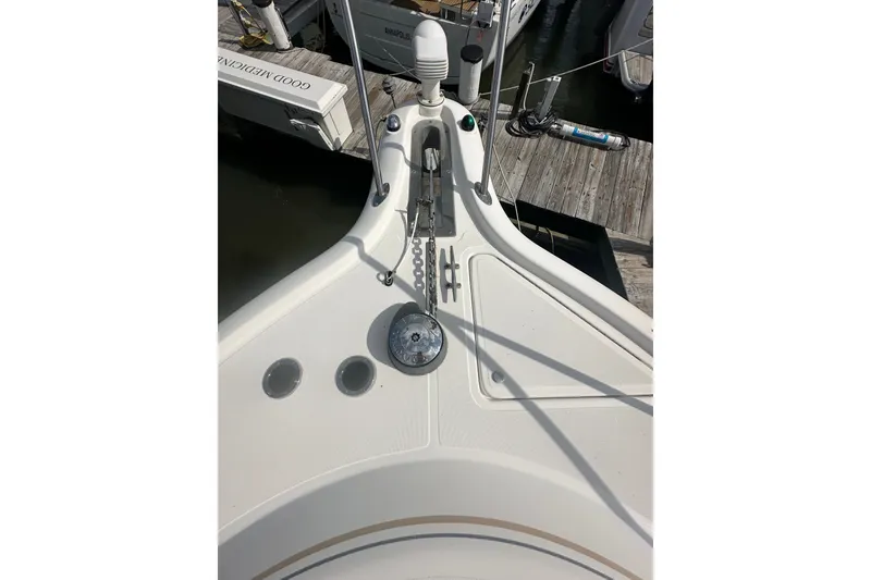 Slide: The Image of Bow view of 2005 Tiara Yachts 2900 Coronet, docked with anchor chain visible. - 9