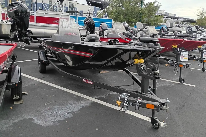 The Image of 2027 Tracker Bass Tracker Classic XL boat on trailer in parking lot. - 0
