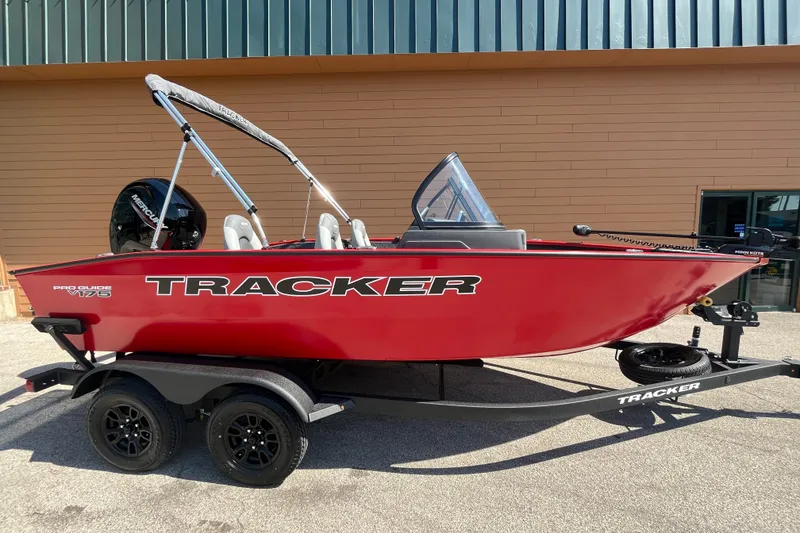 The Image of 2027 Tracker Pro Guide V-175 Combo boat in vibrant red on trailer. - 0
