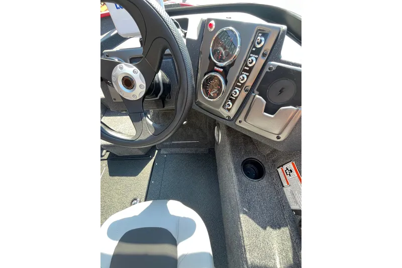 Slide: The Image of Interior dashboard of 2027 Tracker Pro Guide V-175 Combo boat with steering wheel and gauges. - 64