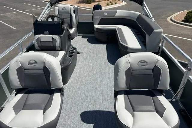 Slide: The Image of 2027 Sun Tracker Bass Buggy 16 XL Select pontoon boat with spacious seating and modern design. - 16