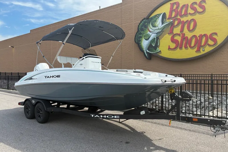 Slide: The Image of 2027 Tahoe 2150 CC boat on trailer outside Bass Pro Shops. - 4