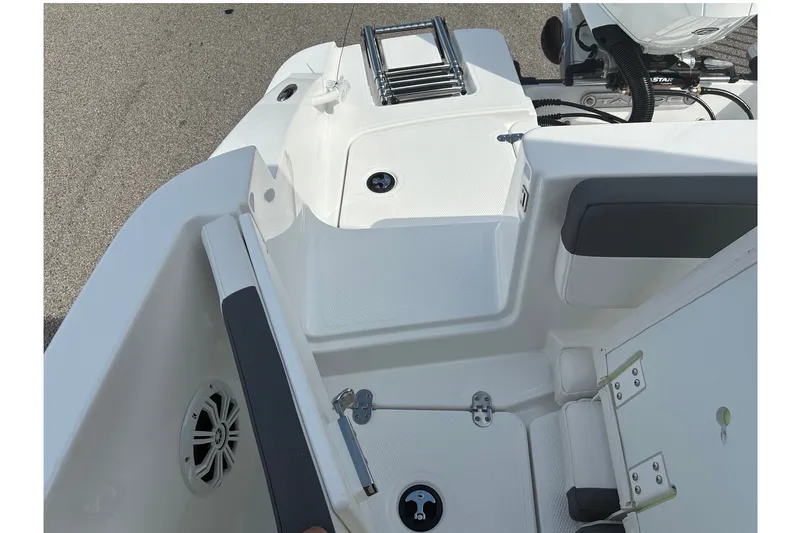 Slide: The Image of 2027 Tahoe 2150 CC boat interior with seating and ladder detail. - 10