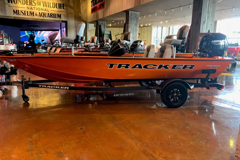The Image of 2027 Tracker Pro Team 175 boat displayed indoors at a museum. - 0