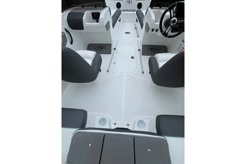 Slide: The Image of Interior view of 2027 Tahoe T21 boat, featuring sleek seating and modern dashboard design. - 7