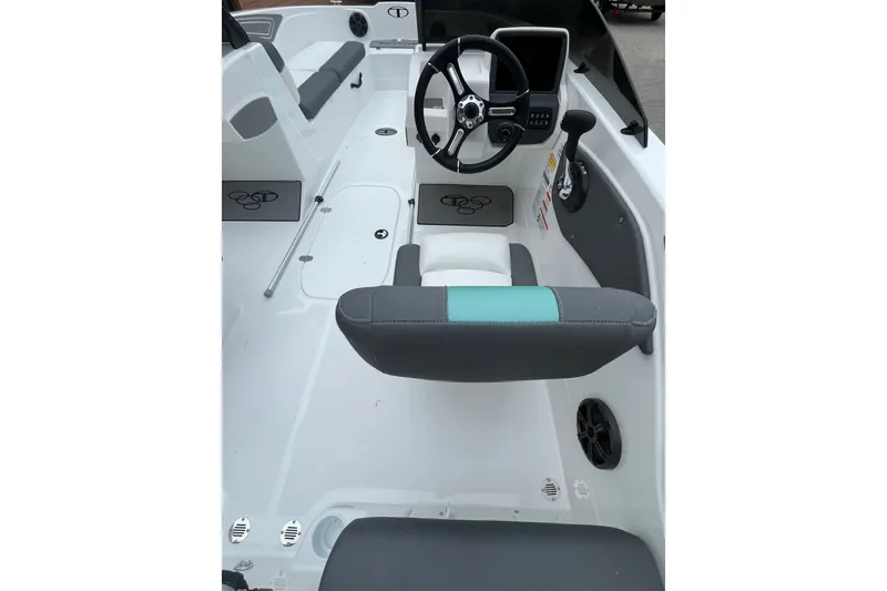 Slide: The Image of 2027 Tahoe T21 boat interior with steering wheel and seating. - 5