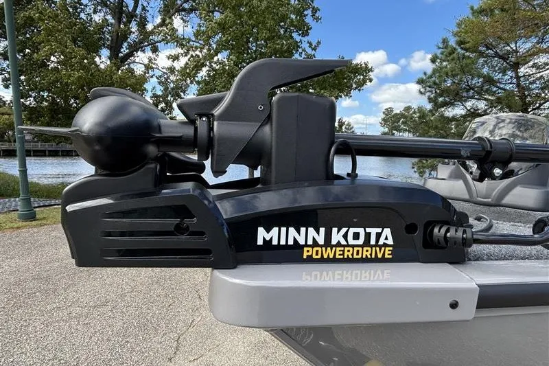 Slide: The Image of Minn Kota PowerDrive motor on 2027 Tracker Super Guide V-16 SC boat, outdoor setting. - 14