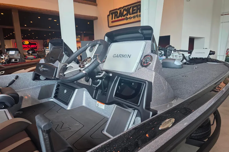 Slide: The Image of 2027 Nitro Z21 XL Pro boat interior with Garmin navigation system, displayed at Tracker Boats showroom. - 3