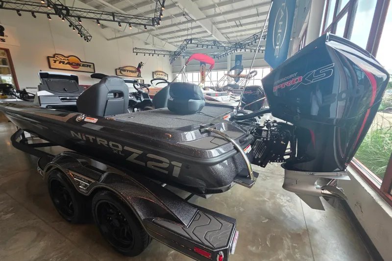 Slide: The Image of 2027 Nitro Z21 XL Pro boat with Mercury Pro XS engine in showroom. - 7