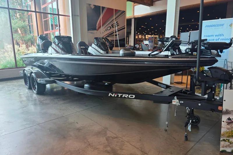 The Image of 2027 Nitro Z21 XL Pro boat displayed indoors on a trailer. - 0