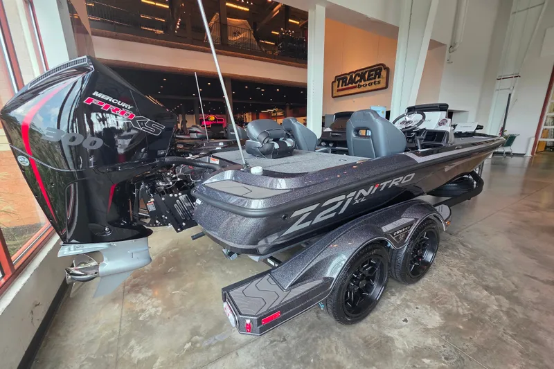Slide: The Image of 2027 Nitro Z21 XL Pro boat with Mercury Pro XS 300 engine in showroom. - 4