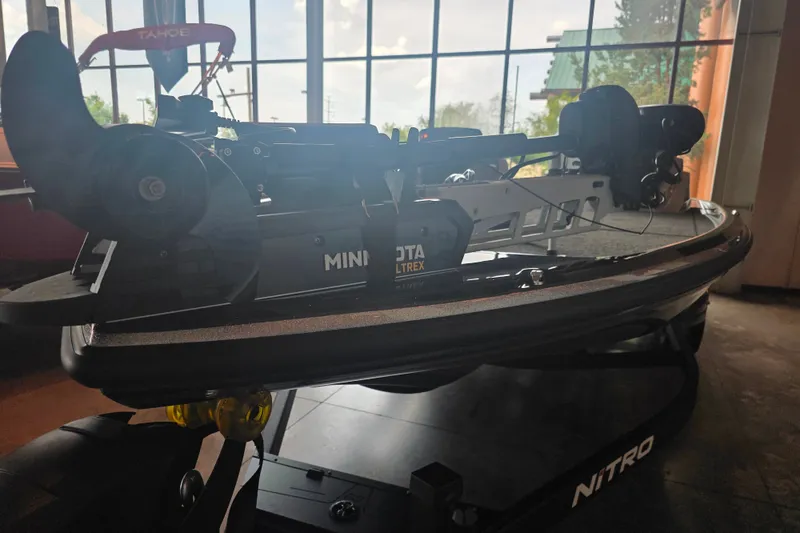 Slide: The Image of 2027 Nitro Z21 XL Pro boat with Minn Kota Ultrex motor in showroom. - 6