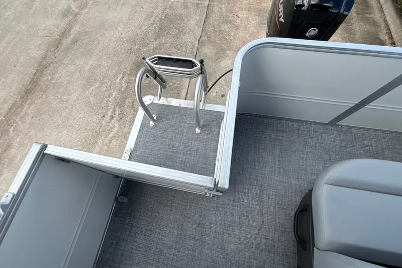 Slide: The Image of 2027 Sun Tracker Party Barge 18 DLX pontoon boat with ladder and Mercury engine. - 37