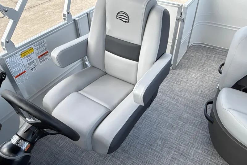 Slide: The Image of Captain's chair in 2027 Sun Tracker Party Barge 18 DLX pontoon boat interior. - 21
