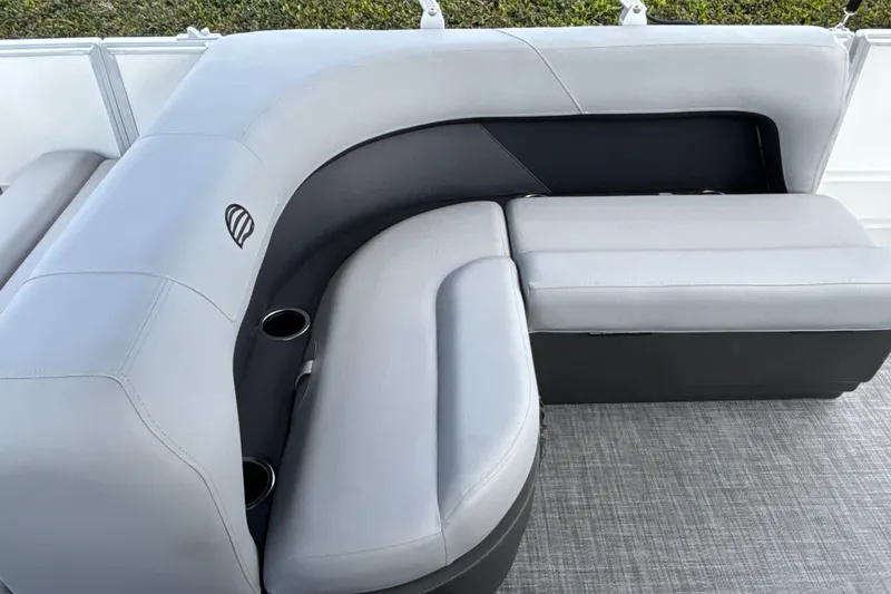 Slide: The Image of 2027 Sun Tracker Party Barge 18 DLX seating with cup holders and sleek design. - 14