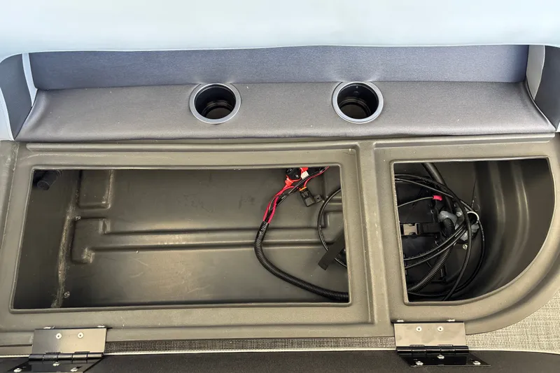 Slide: The Image of Storage compartment of 2027 Sun Tracker Party Barge 18 DLX with wiring visible. - 35