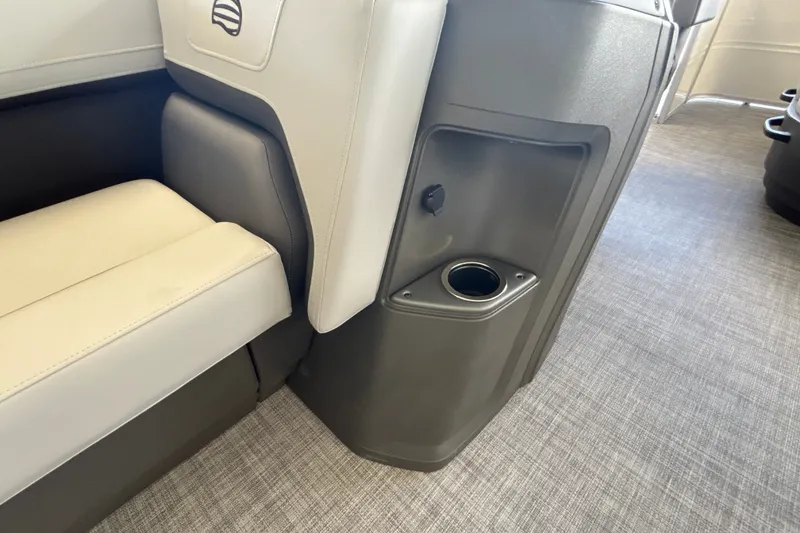 Slide: The Image of Interior of 2027 Sun Tracker Party Barge 18 DLX with cup holder and seating. - 28