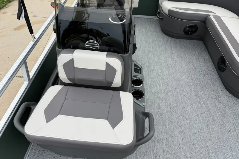 Slide: The Image of Interior of 2027 Sun Tracker Bass Buggy 16 XL Select pontoon boat with seating and cup holders. - 15