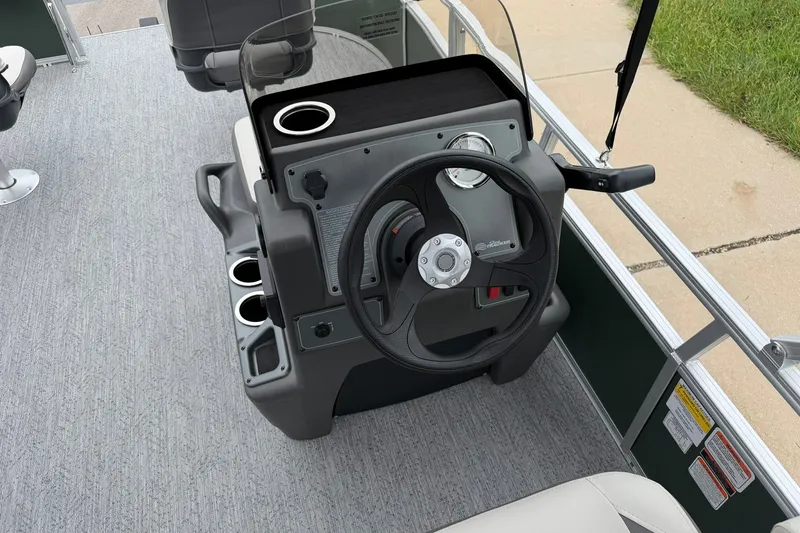 Slide: The Image of Steering console of 2027 Sun Tracker Bass Buggy 16 XL Select pontoon boat. - 18