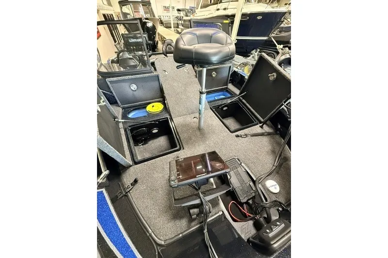 Slide: The Image of 2024 Nitro ZV20 boat interior with storage compartments and seating. - 18
