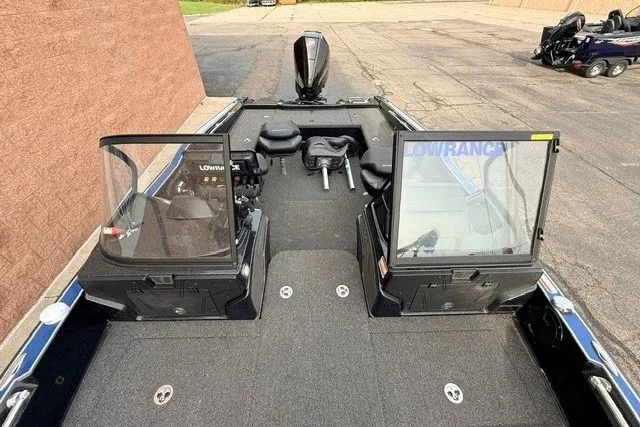 Slide: The Image of 2024 Nitro ZV20 boat interior with dual consoles and Lowrance electronics. - 15