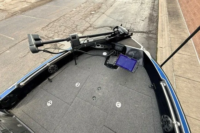 Slide: The Image of 2024 Nitro ZV20 boat deck with mounted equipment and navigation screen. - 14