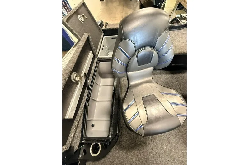 Slide: The Image of 2024 Nitro ZV20 boat seat with storage compartment, featuring sleek design and blue accents. - 23