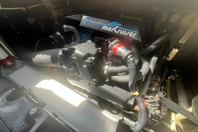Slide: The Image of 1989 Sea Ray 300 Weekender engine compartment with MerCruiser engine. - 33