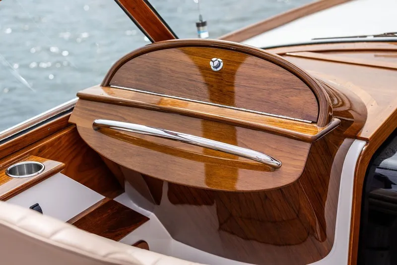 Slide: The Image of 2025 Hinckley Yachts Talaria 29 Runabout, elegant wooden dashboard detail. - 4