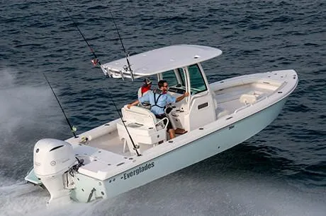 Slide: The Image of Manufacturer Provided Image: 2020 Everglades 253 Center Console boat cruising on the water. - 1