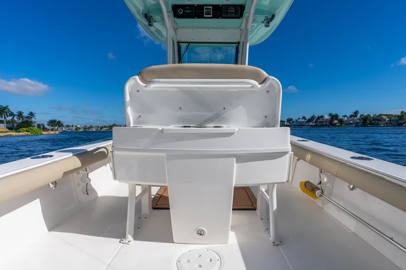 Slide: The Image of 2020 Everglades 253 Center Console boat interior with ocean view and clear blue sky. - 40