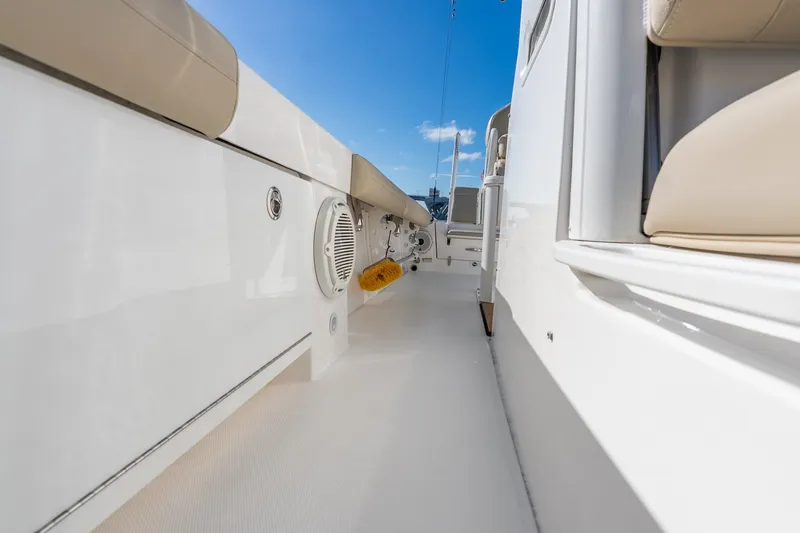 Slide: The Image of 2020 Everglades 253 Center Console boat interior with seating and speaker. - 41
