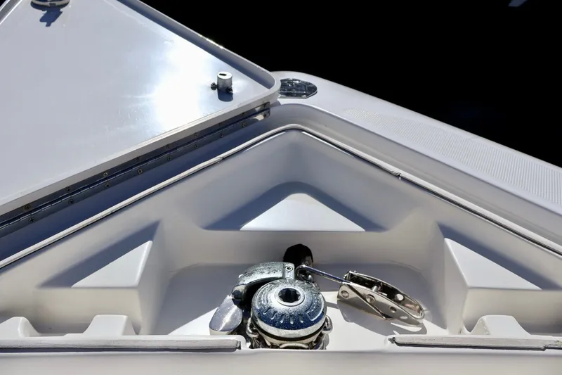 Slide: The Image of Bow compartment of 2010 Deep Impact 330 C boat with anchor winch. - 41