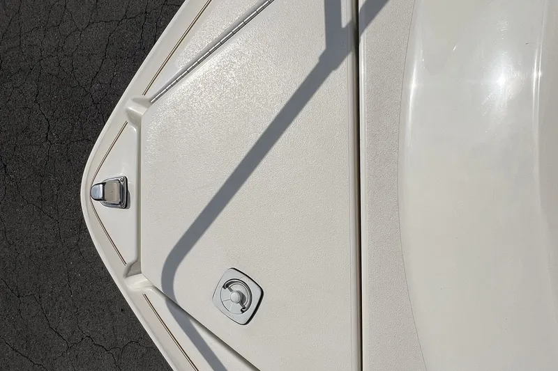 Slide: The Image of Bow of a 1997 Sea Ray 240 Overnighter boat, featuring sleek design and hardware. - 33