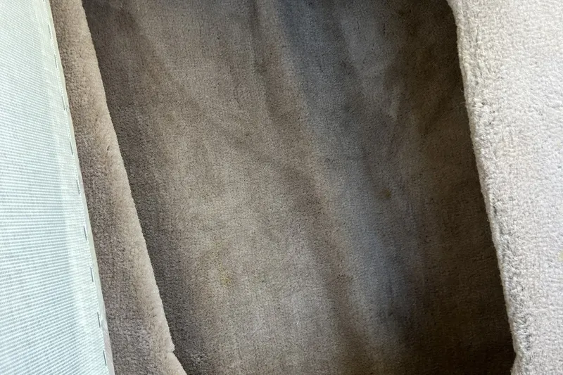 Slide: The Image of Interior carpet of a 1997 Sea Ray 240 Overnighter boat. - 48