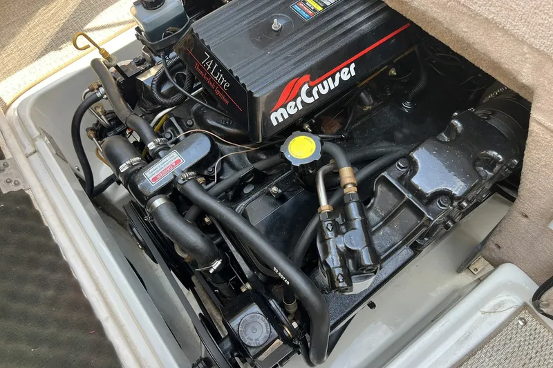 Slide: The Image of Engine compartment of a 1997 Sea Ray 240 Overnighter with MerCruiser 4.3L engine. - 99