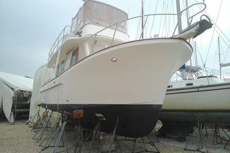 Slide: The Image of 2005 Mariner 34 Orient yacht on stands in a boatyard. - 5