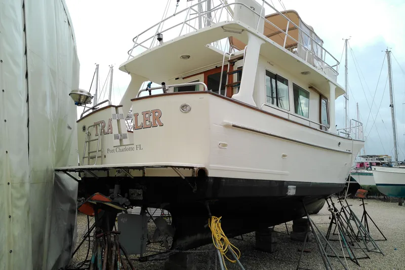 Slide: The Image of 2005 Mariner 34 Orient boat on dry dock in Port Charlotte, FL. - 11