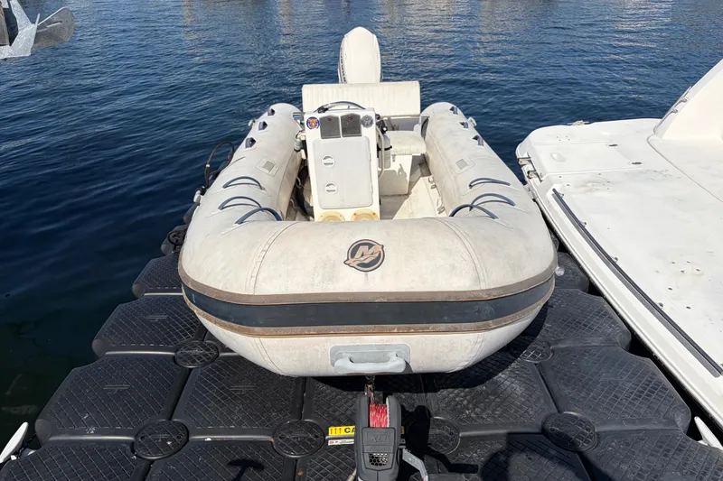 Slide: The Image of Inflatable dinghy docked beside a 1999 Cruisers Yachts 3870 Esprit. - 31
