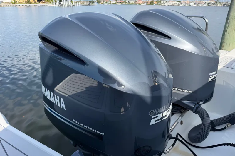 Slide: The Image of Twin Yamaha 250 outboard engines on a 2021 Jeanneau Cap Camarat 9.0 WA boat. - 28