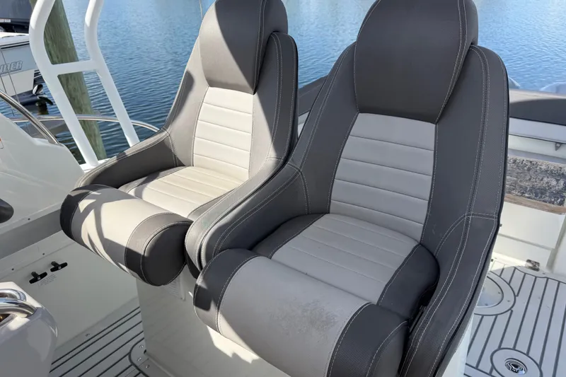 Slide: The Image of Luxury seating on 2021 Jeanneau Cap Camarat 9.0 WA boat, featuring sleek design and comfort. - 17
